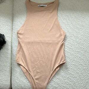 Nude body suit